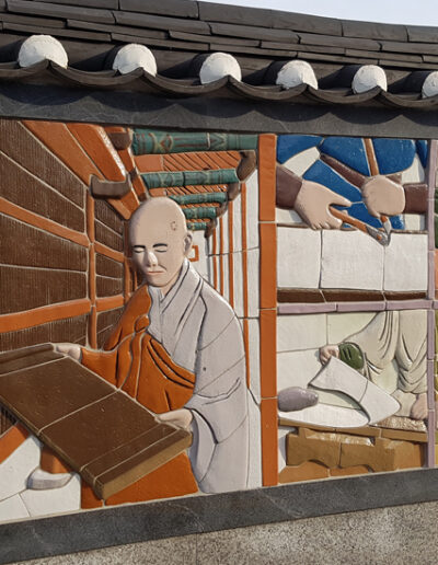 A wall mosaic in Ganghwa showing wood block printing