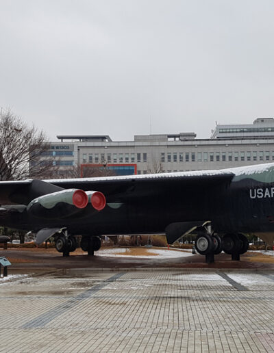 The outside display area at the War Memorial of Korea showing some of the large weapons used in the war - an American B52 bomber.