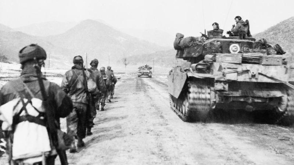 British soldiers, part of the Gloucestershire Regiment, and a Centurion tank, advancing towards Hill 327, March 1951